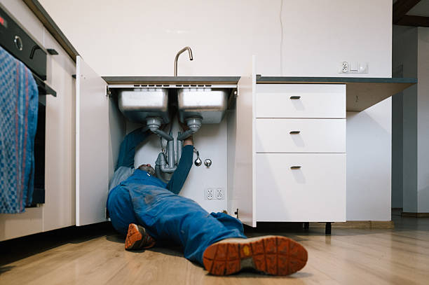 Professional Plumbing technician working in Seymour, CT